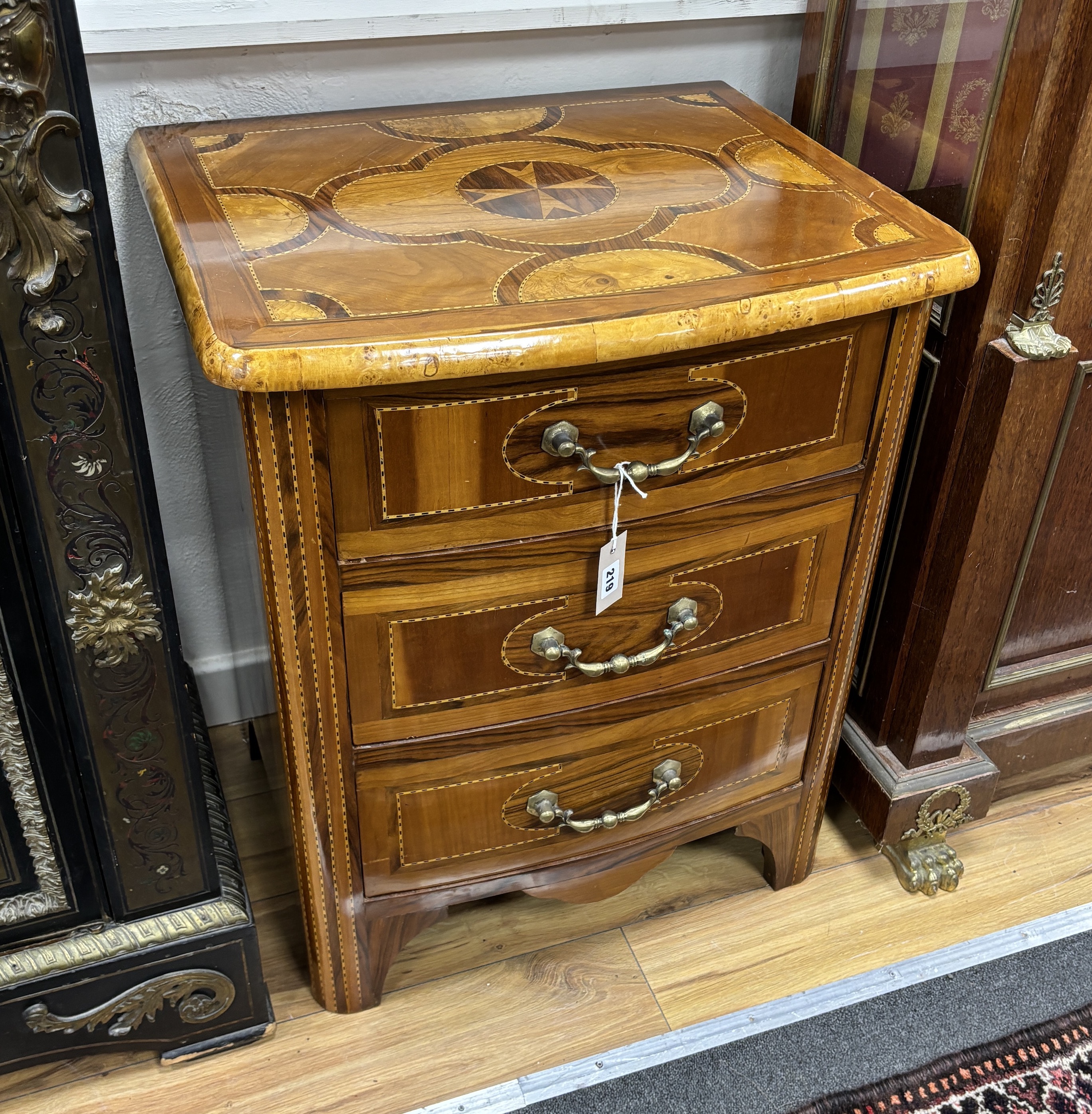 A Dutch style bow front three drawer small chest, width 62cm, depth 50cm, height 76cm